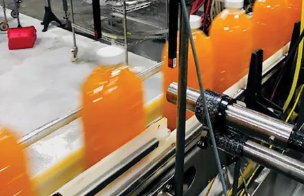 Linx 8900 CIJ printer marking on plastic beverage bottles 